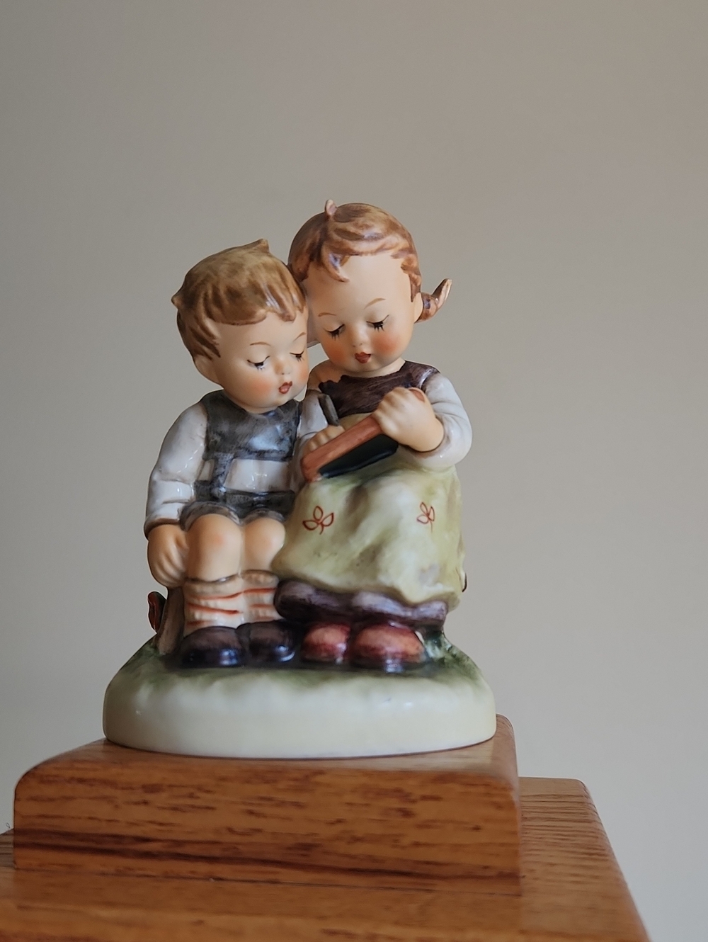 Goebel Two Children Reading Porcelain Figurine in Cream, Green, Brown